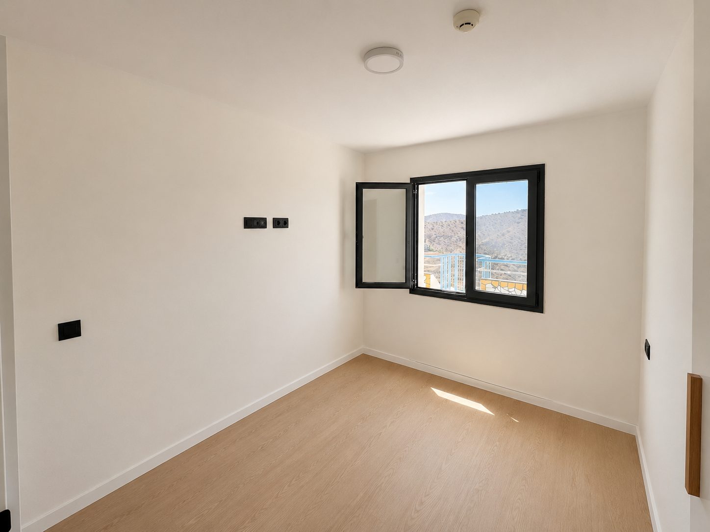 Dormitorio del apartamento piloto