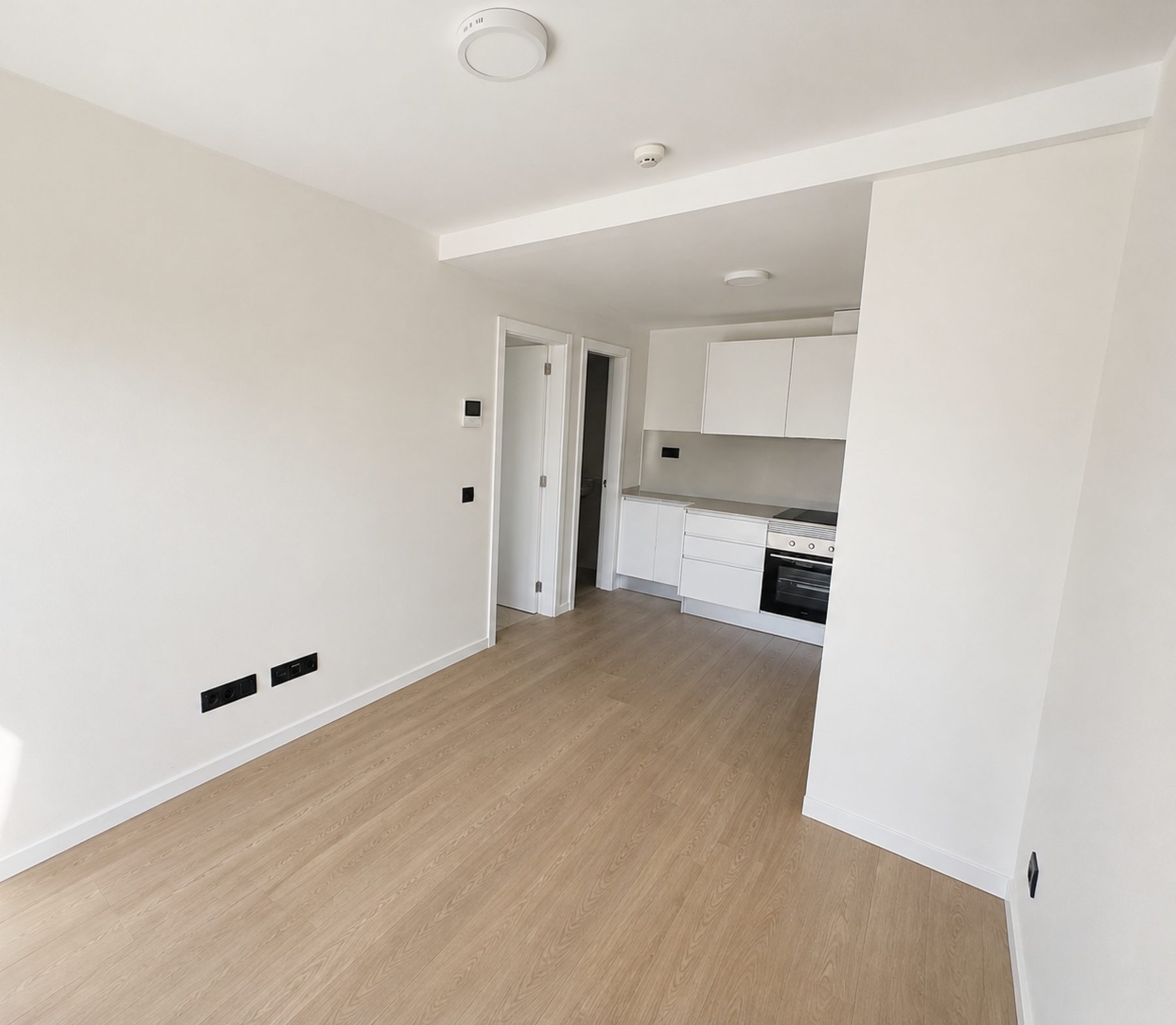 Salón y cocina del apartamento piloto
